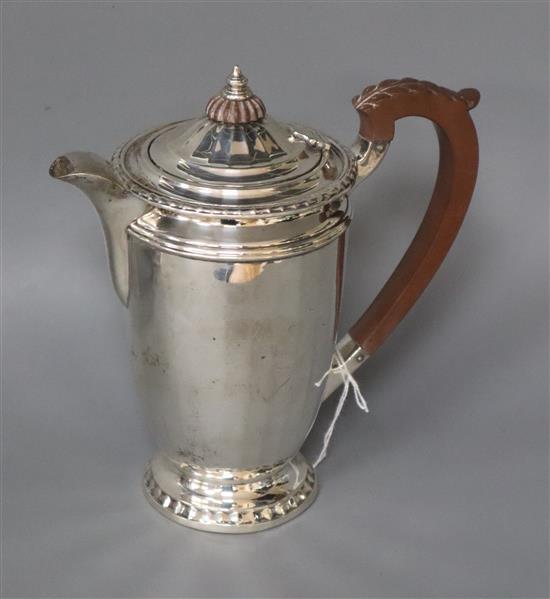 A 1930s silver hot water pot, Birmingham, 1933, gross 11 oz.